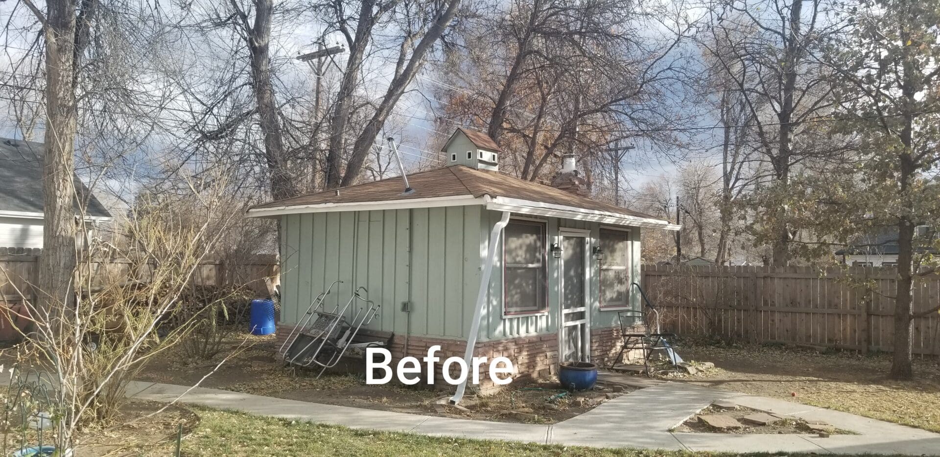 Small backyard with a green shed.